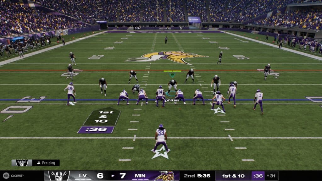 Madden 25 Capture - A football game in progress with players from LV and MIN teams on the field, seen from a gameplay perspective.