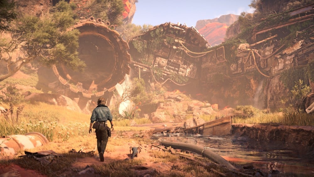 In an overgrown landscape, a Kay and their small animal companion, Nix, walk towards a giant rusted machine structure, conjuring images of Star Wars Outlaws navigating forgotten relics.