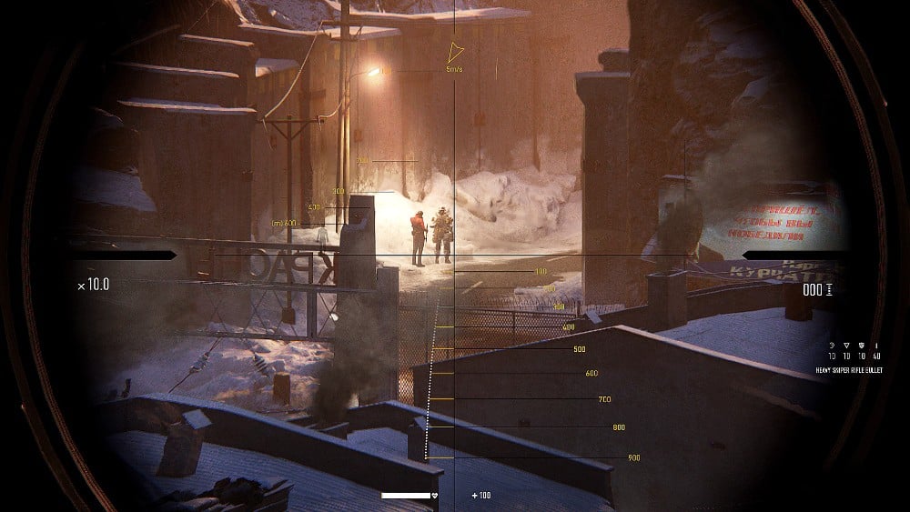 In Sniper Ghost Warrior Contracts, experience a first-person shooter game view, with the crosshair aiming at armed characters in a snowy, industrial environment.