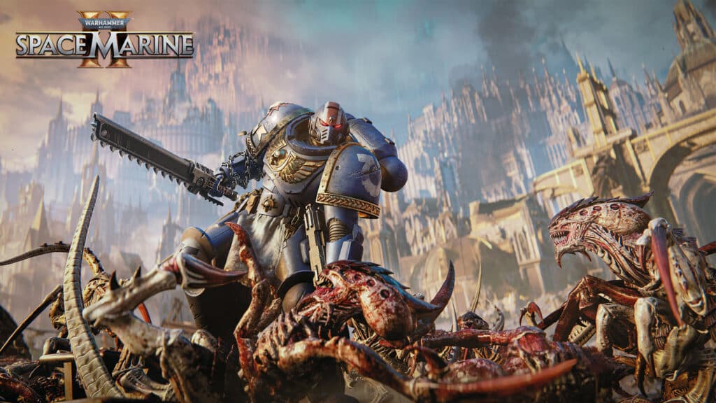 A heavily armored space marine wielding a chainsword fights against alien creatures in a war-torn cityscape, embodying the intense action fans expect in the upcoming Space Marine 2 review.