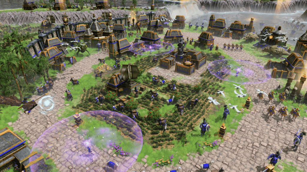 Age of Mythology Retold Screen Capture - Fantasy village with futuristic elements, glowing purple barriers, and soldiers amidst lush greenery and stone pathways.