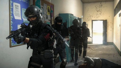 A tactical team in black gear and helmets with rifles moves through a school hallway, a figure lying on the floor, all part of V1.0 Launches For Zero Hour.