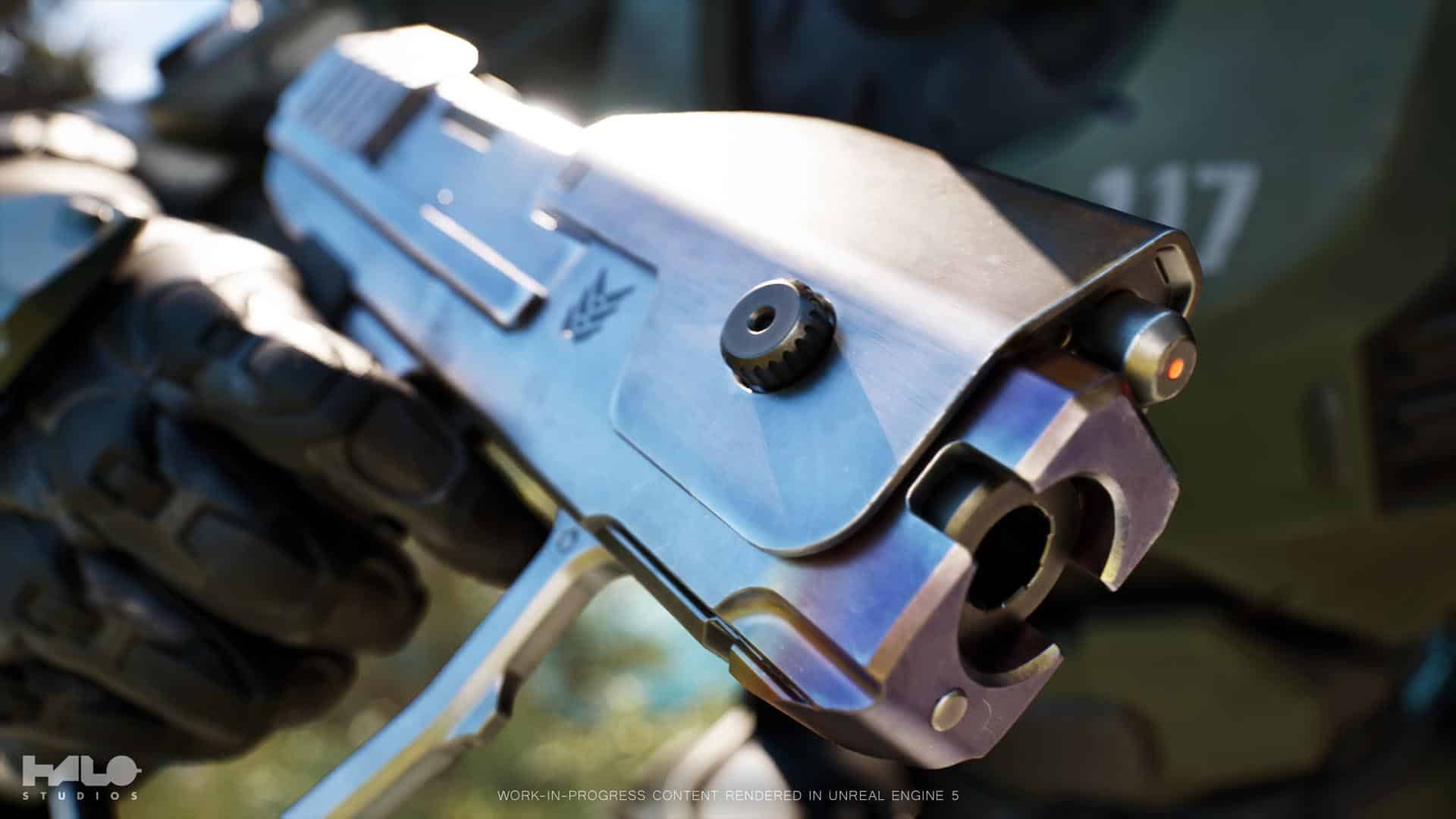 A picture from Project Foundry of a futuristic handgun held by a gloved hand, with "117" visible in the background.