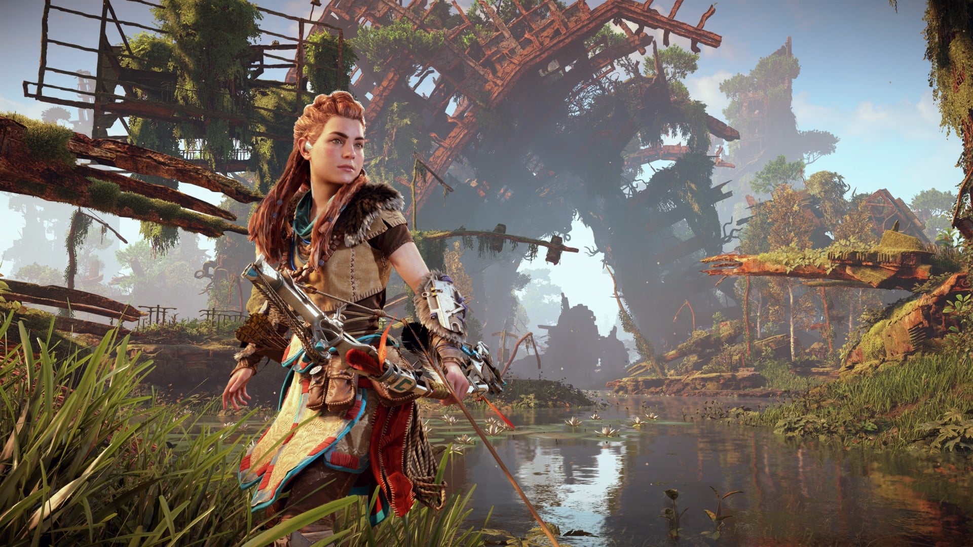 Aloy stands by a pond in a lush, post-apocalyptic landscape with ruins in the background, evoking the immersive world of Horizon Zero Dawn Remastered.