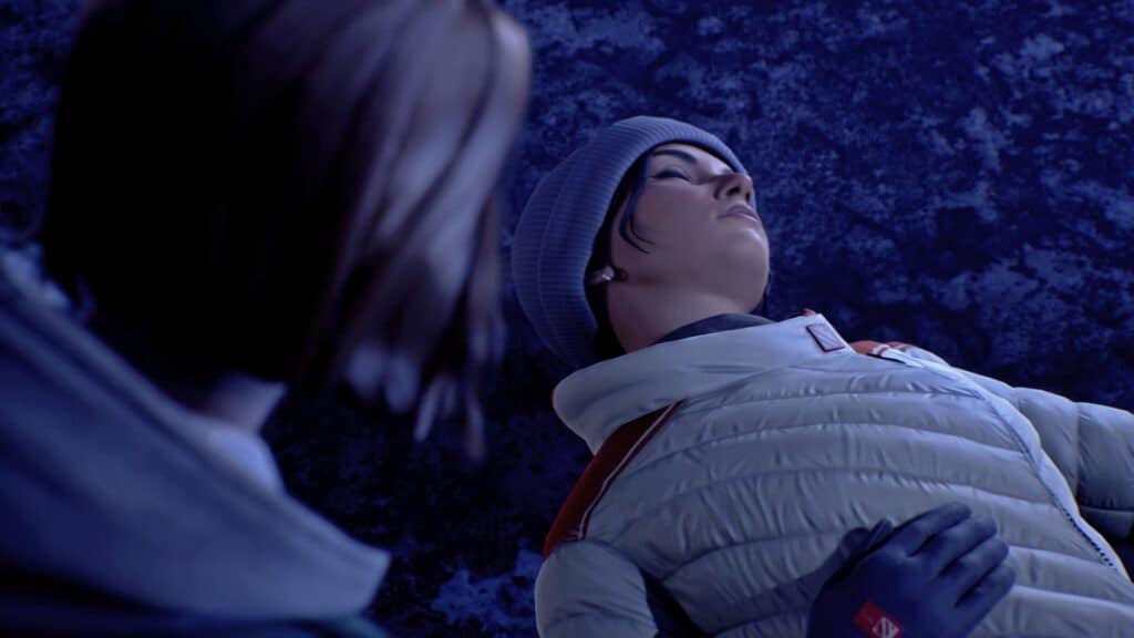 Safi lies on the ground at night, their beanie and puffer jacket reminiscent of a scene from Life is Strange: Double Exposure.