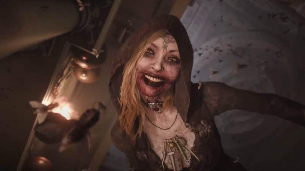 In the dim, eerie setting in Resident Evil Village, a creepy character with a hood and wide smile lurks, their bloodstained mouth reminiscent of something from the scariest games to play.