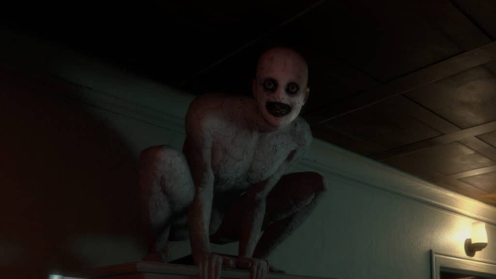 A creepy figure from The Mortuary Assistant with dark eyes and cracked skin crouches on a cabinet in the dimly lit room, evoking the eerie atmosphere of the scariest games to play.