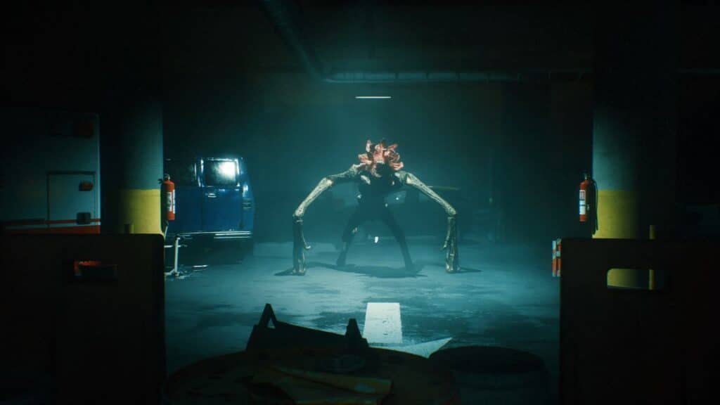 In the dimly lit garage, a creature with long limbs stands silently, its presence as tense as a scene from "A Quiet Place: The Road Ahead," surrounded by vehicles and fire extinguishers.