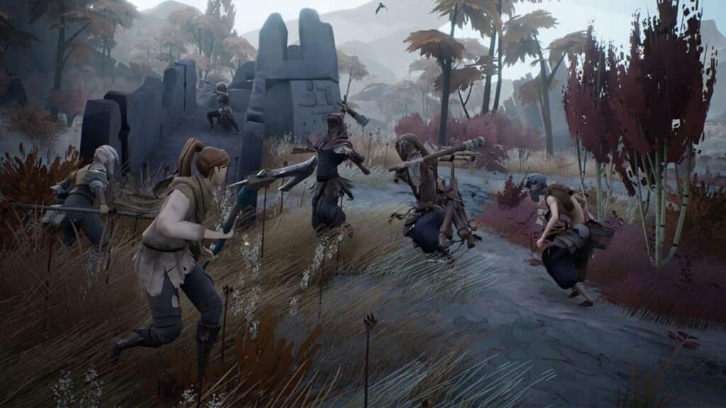 Amidst the ashen landscape, characters engage in fierce battles with spears and swords near ancient ruins and autumn-colored trees in a scene from the video game Ashen.