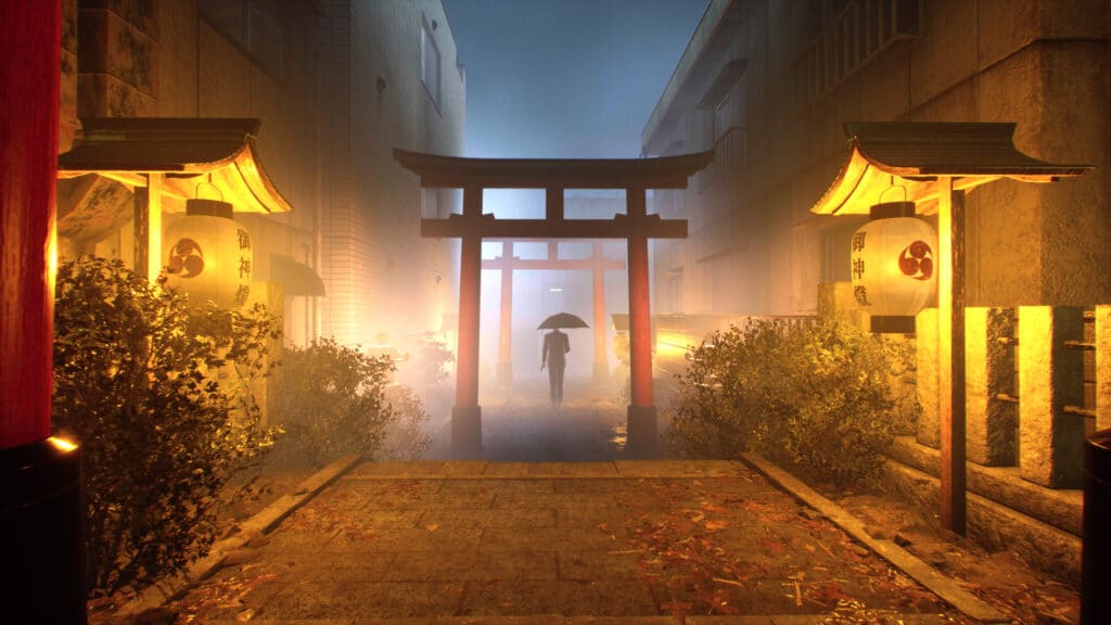 A person with an umbrella walks through a misty street, flanked by lanterns and a torii gate, from Ghostwire: Tokyo's eerie ambiance.