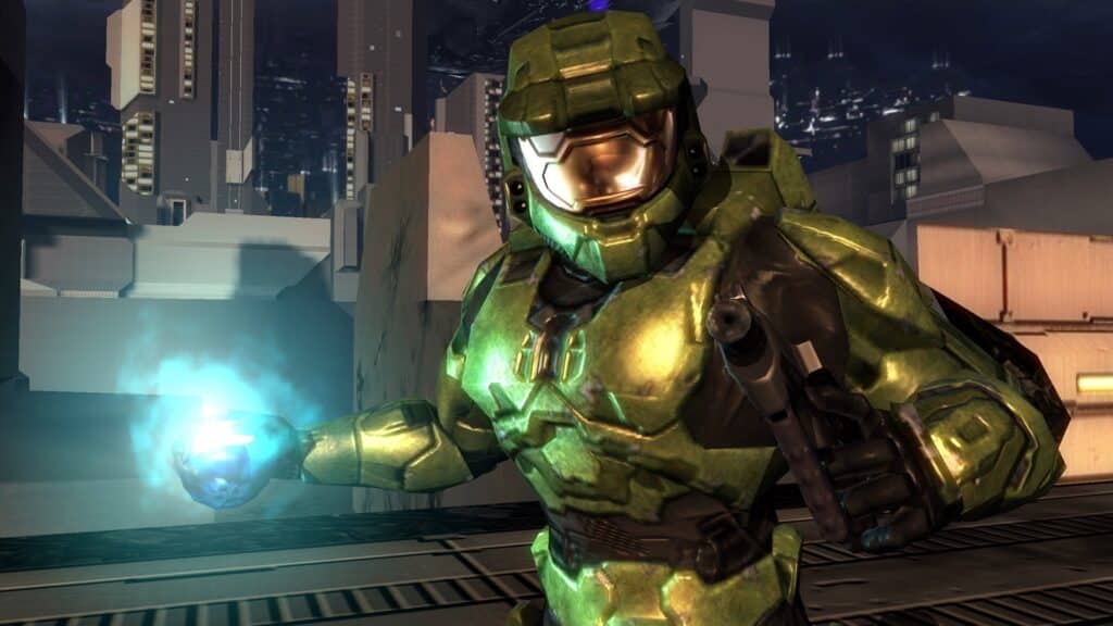 Amidst the neon-lit skyline of a futuristic city, an armored character stands strong, holding a glowing blue sphere. The scene pays homage to the Halo 2 20th anniversary, echoing the game's legendary influence in an otherworldly embrace of technology and design.