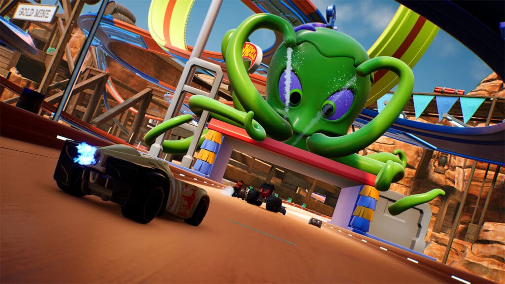 Experience the thrill as toy cars speed around the track, while a giant green alien looms in the background, straight out of Hot Wheels Unleashed 2: Turbocharged.