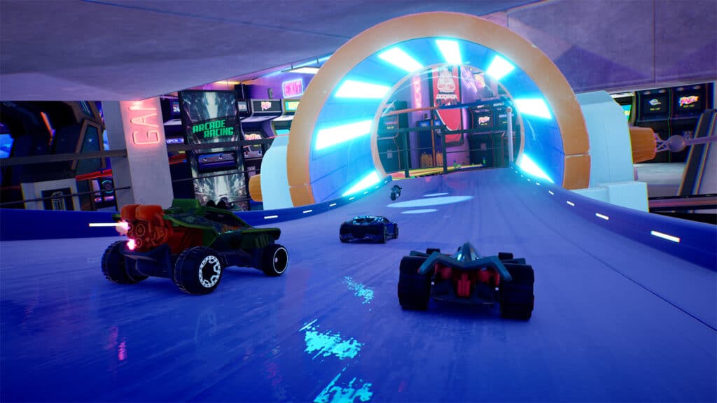 Toy cars from Hot Wheels Unleashed 2: Turbocharged race on a colorful, shiny track with neon lighting and arcade-themed surroundings.