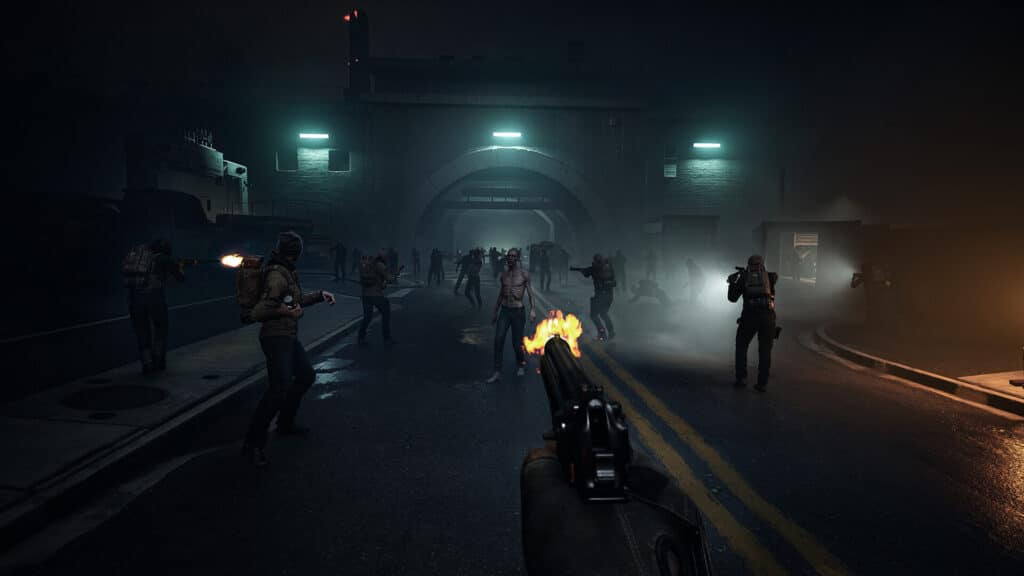 First-person view of a dark, atmospheric "No More Room in Hell 2" zombie apocalypse scene with armed survivors navigating eerie lighting.