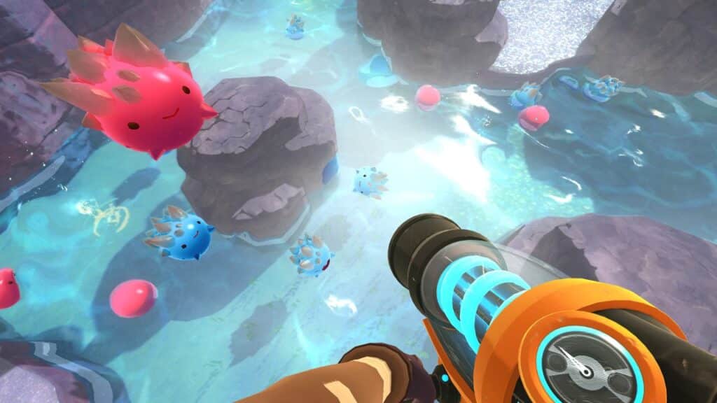 In a vibrant, watery landscape brimming with colorful floating creatures, remnants of a Slime Rancher adventure, futuristic weapons lie amidst the rocks.