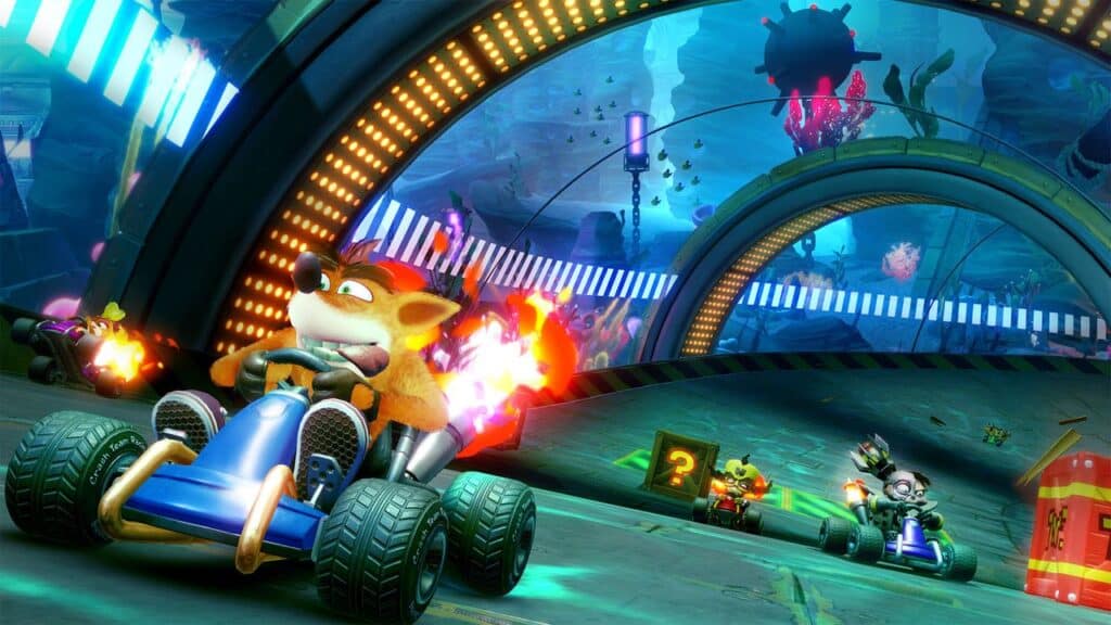 Cartoon animals race in go-karts through a colorful, underwater-themed tunnel with glowing lights, reminiscent of the vibrant tracks found in Crash Team Racing Nitro-Fueled.