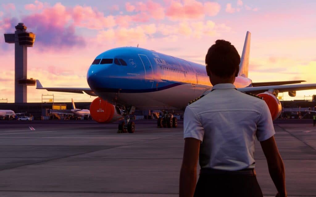 A pilot stands facing a KLM airplane on the tarmac at sunset, with an airport tower silhouetted in the background, evoking scenes reminiscent of Microsoft Flight Simulator 2024.