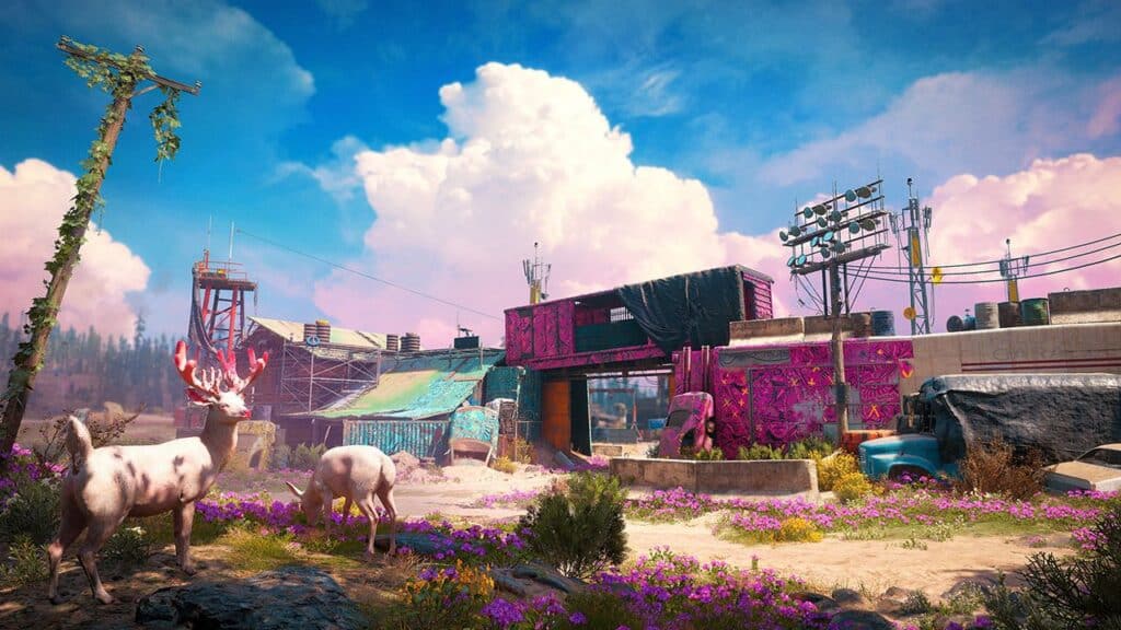 Two deer stand in a colorful, makeshift settlement surrounded by flowers, under a blue sky with fluffy clouds, reminiscent of the vibrant landscapes in Far Cry: New Dawn now available on Xbox Game Pass.