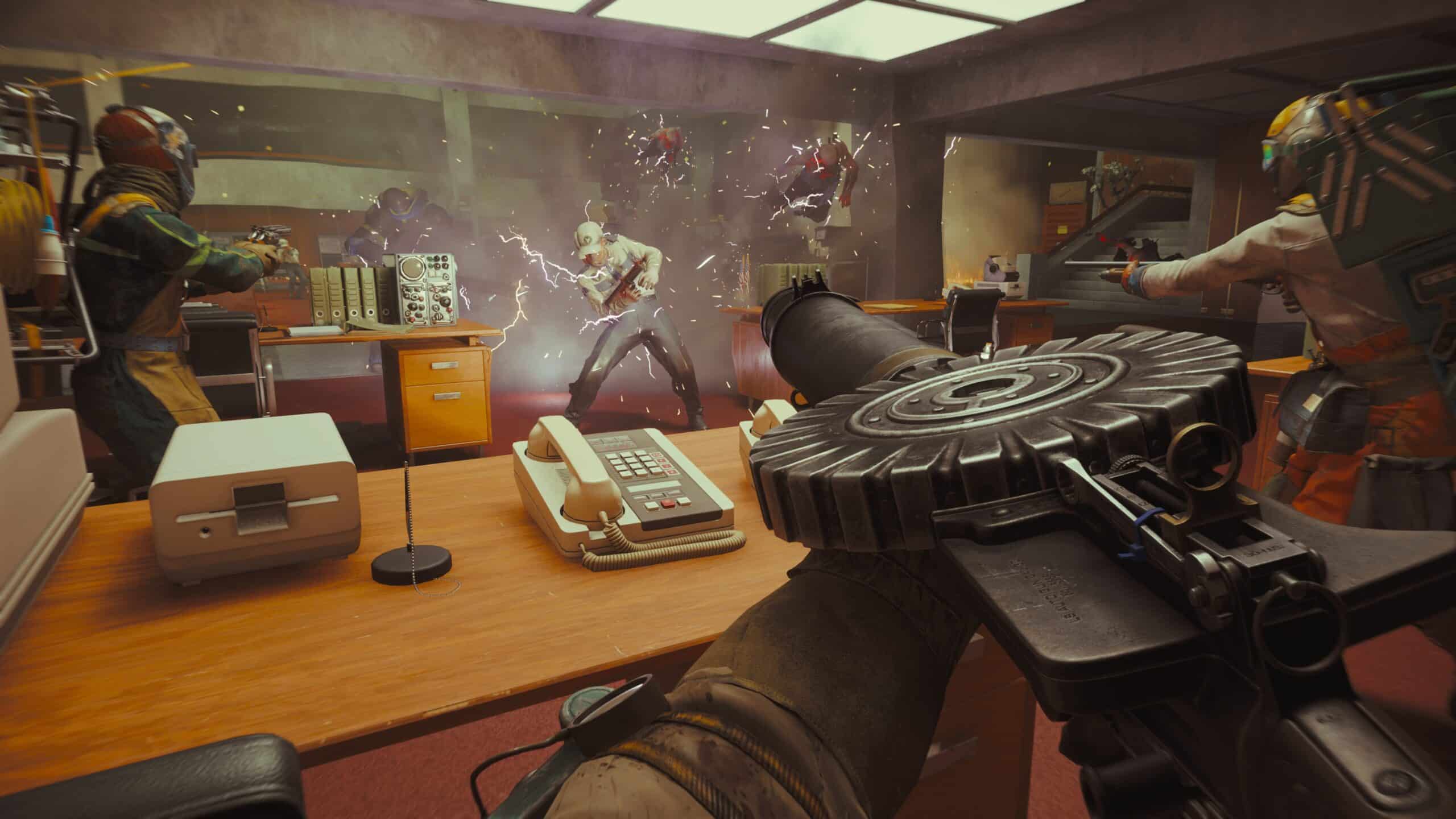 Experience the action in first-person view during an intense office standoff, as seen in the FBC: Firebreak livestream—featuring armed characters and a figure struck by electricity or energy blasts.