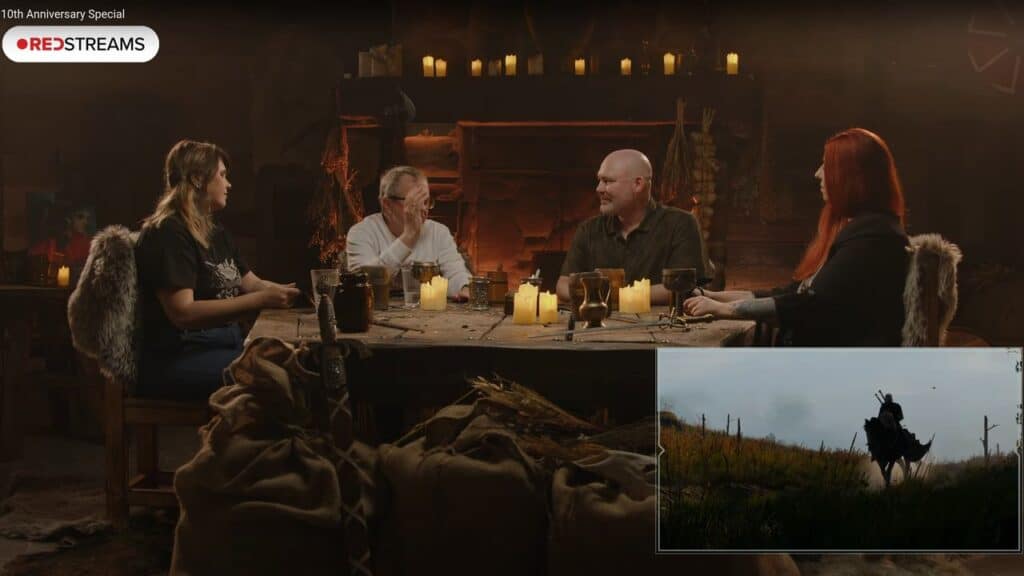 Four people sit around a candle-lit table in a rustic room, evoking The Witcher 3 anniversary spirit; inset shows a figure standing in a grassy field.
