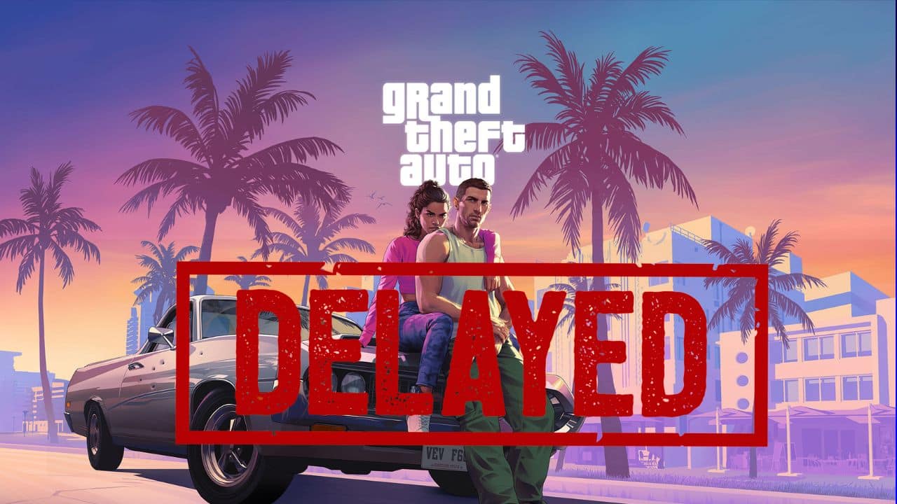 Two characters lean on a car as the "Grand Theft Auto" logo and a bold red "DELAYED" stamp overlay the image, hinting at uncertainty around the Grand Theft Auto VI release date.