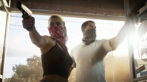 Two people wearing bandanas over their faces point guns inside a sunlit building, recreating a scene reminiscent of Grand Theft Auto VI release date speculations.