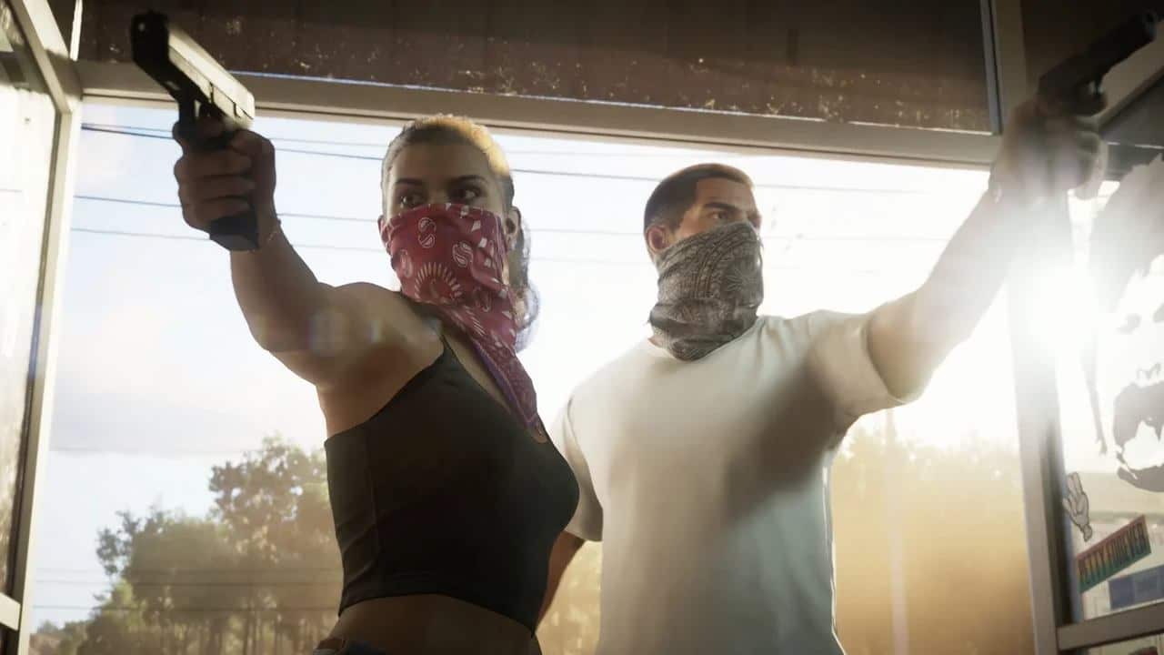 Two people wearing bandanas over their faces point guns inside a sunlit building, recreating a scene reminiscent of Grand Theft Auto VI release date speculations.