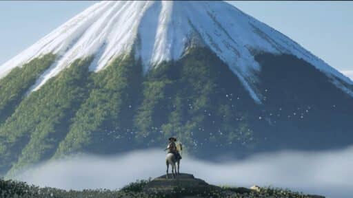 A person on horseback stands on a hill, gazing at the snow-capped Ghost of Yotei mountain rising majestically in the distance.
