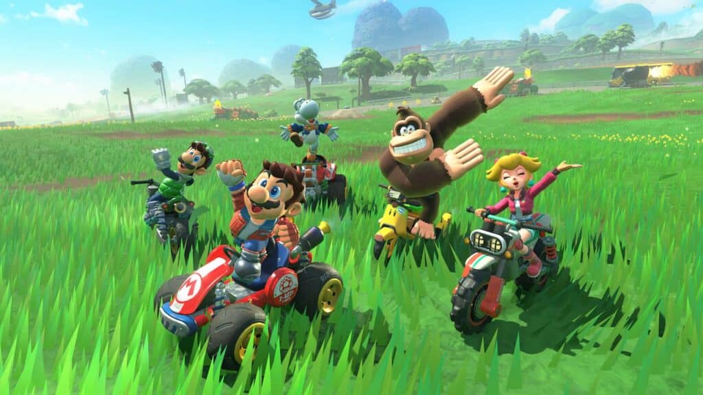 Mario, Luigi, Peach, Donkey Kong, and others ride ATVs and pose on a grassy field in Mario Kart World on Nintendo Switch 2.