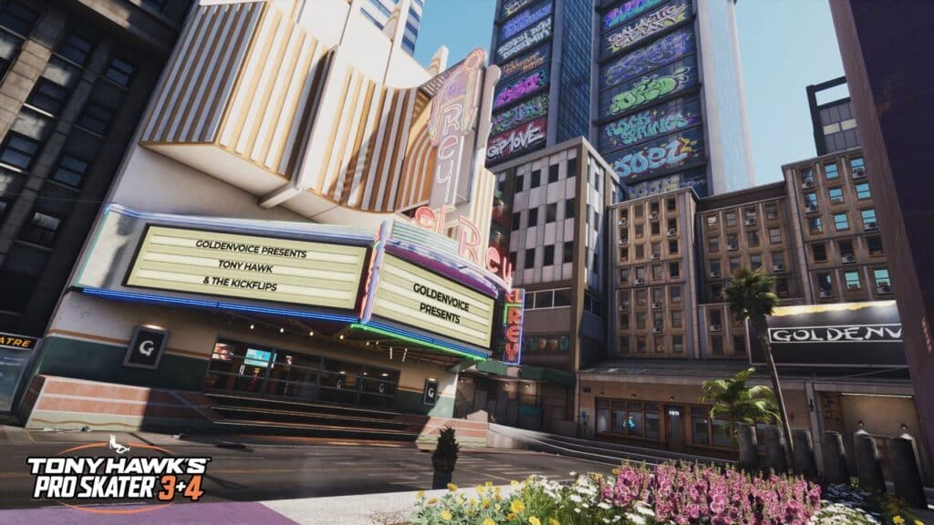 A city street scene with a retro theater marquee and tall colorful buildings, inspired by the vibrant levels of Tony Hawk’s Pro Skater 3 + 4.