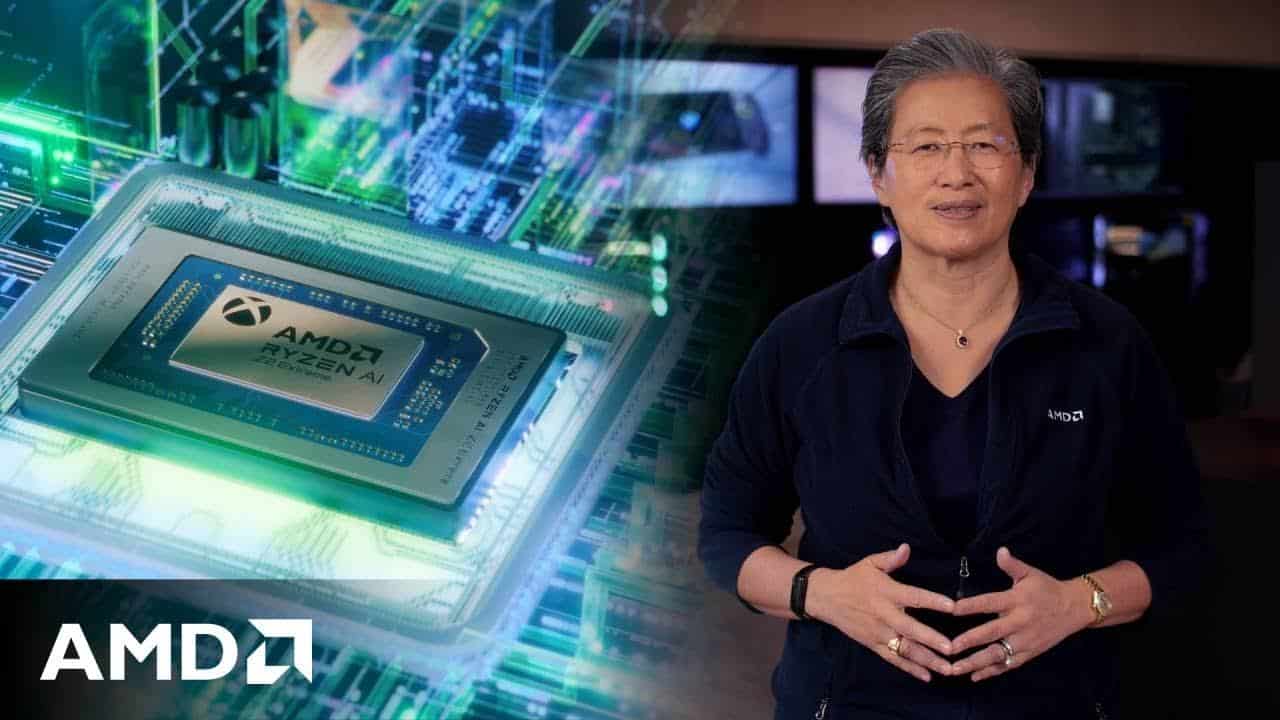 A person in front of a large AMD Ryzen AI chip graphic, highlighting the Xbox AMD partnership, with the AMD logo in the corner.