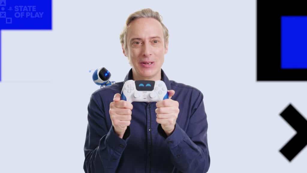 A smiling person holds a PlayStation controller with a small robot on their shoulder, excited for upcoming PS5 games, against a light background.