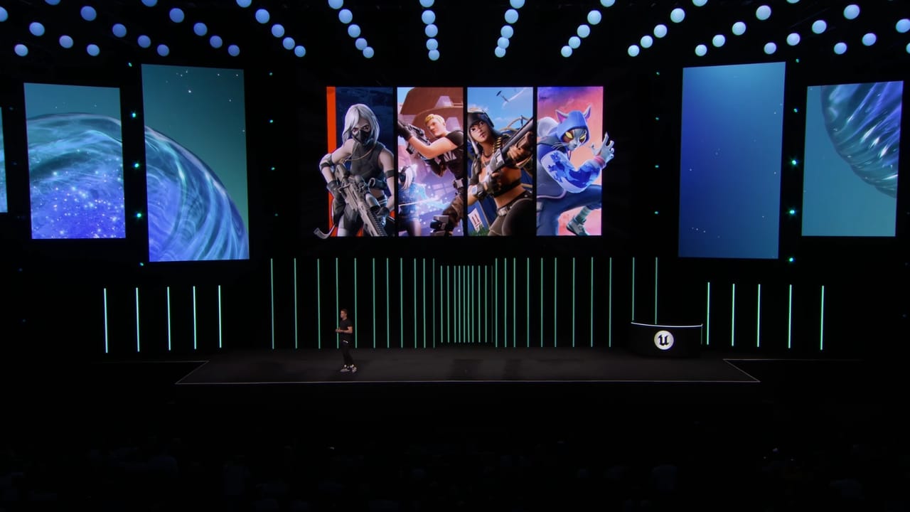 A presenter stands onstage beneath large gaming character images and the Unreal Engine logo at the Fortnite State of Unreal 2025 tech event.