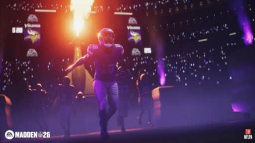 Football players enter a stadium with purple lights and fire effects, setting the stage for the Madden NFL 26 gameplay trailer.