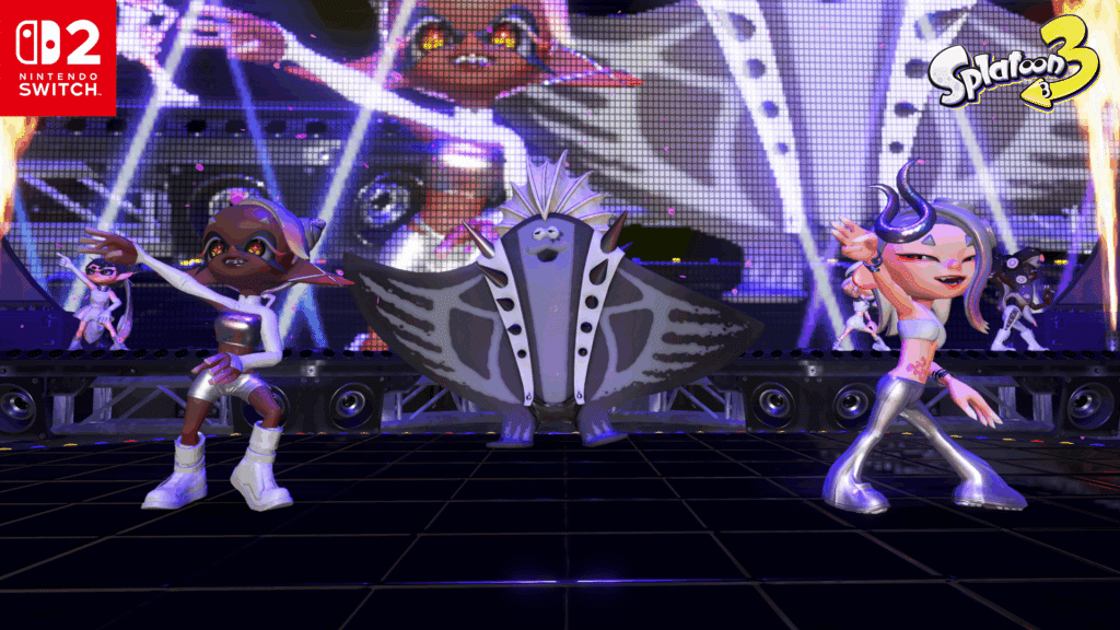 Animated Splatoon Raiders characters perform on a colorful stage with bright lights and futuristic outfits in Splatoon 3 on Nintendo Switch 2.