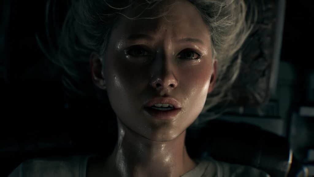 A close-up of a woman with light hair lying down, looking up with a worried expression in dim lighting, captures the tense mood seen in the Resident Evil Requiem trailer.