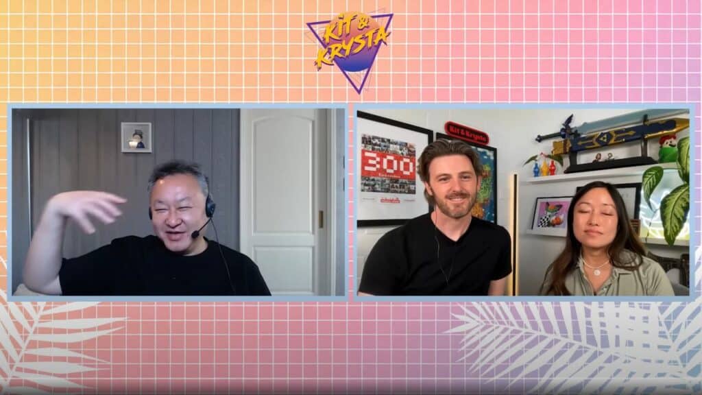 A video call with one man on the left and a man and woman on the right, set against a colorful retro background as Shuhei Yoshida talks Nintendo.