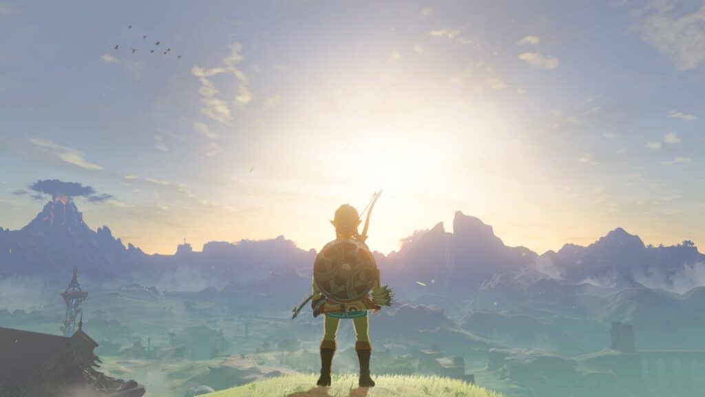Link stands on a hill, overlooking a bright sunrise and vast landscape with mountains, inspired by The Legend of Zelda: Breath of the Wild Nintendo Switch 2 Edition.