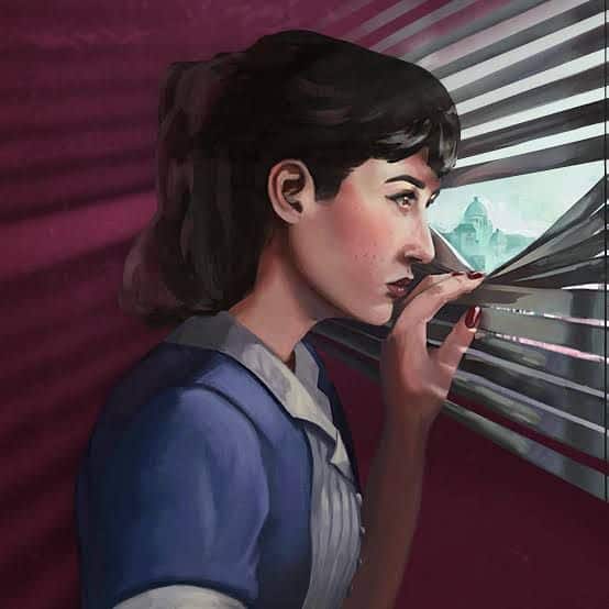 A woman in a blue shirt, inspired by This Bed We Made, peers through window blinds with a serious expression, intently observing the world outside.