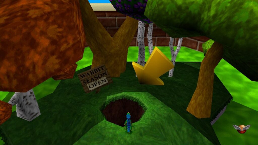 Cartoon forest with colorful trees, a large yellow arrow, a "Wabbit Season Open" sign, a hole, and playful nods to the Gex Trilogy.