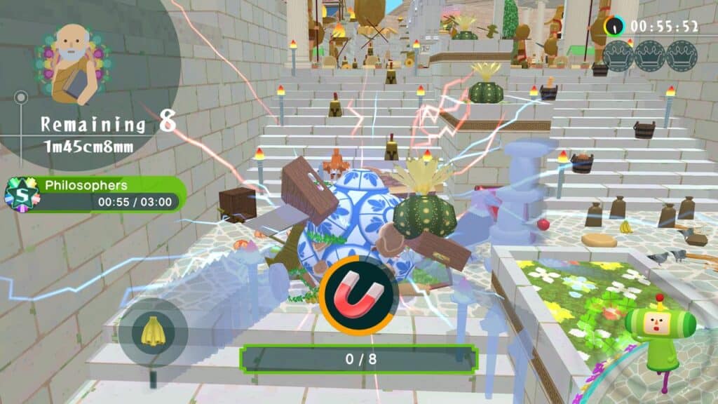 A blue ball with items stuck to it rolls up stone steps in a colorful, whimsical Once Upon a Katamari video game scene.