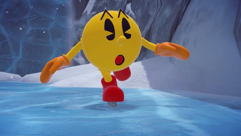 Pac-Man from PAC-MAN WORLD 2 Re-PAC ice skates on a frozen pond, sporting red boots and orange gloves, with snowy cliffs in the background.