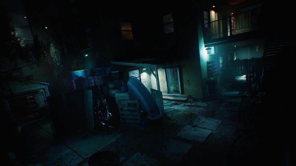 A dimly lit, cluttered alleyway at night with blue lights illuminating doors and windows sets the stage for a tense Ready or Not scenario.