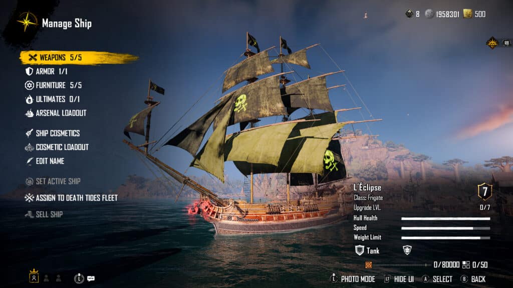 A pirate ship with black sails and green skull emblem docked near a rocky coastline under a blue sky.