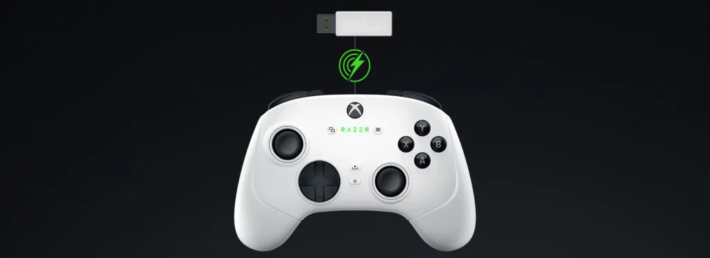 White Xbox-style Razer wireless controller beneath a USB dongle and green wireless connection icon.