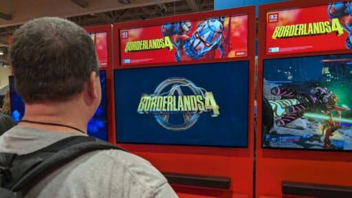 A person watches a screen displaying the "Borderlands 4" game logo at Fan Expo Canada 2025.
