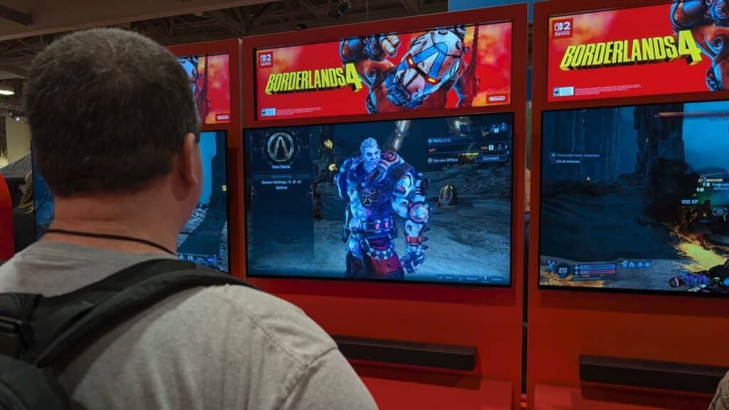 Person with backpack playing Borderlands 4 on Nintendo Switch 2 at Fan Expo Canada 2025.