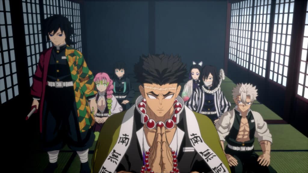 A group of anime characters from Demon Slayer -Kimetsu no Yaiba- The Hinokami Chronicles 2 sit and stand in a traditional Japanese room with shoji screens.