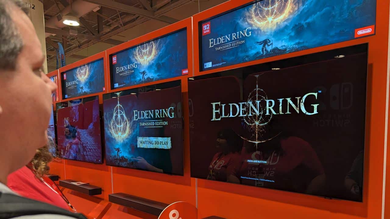 A person checks out monitors displaying Elden Ring: Tarnished Edition on Nintendo Switch 2, sharing their hands-on impressions from Fan Expo Canada 2025.