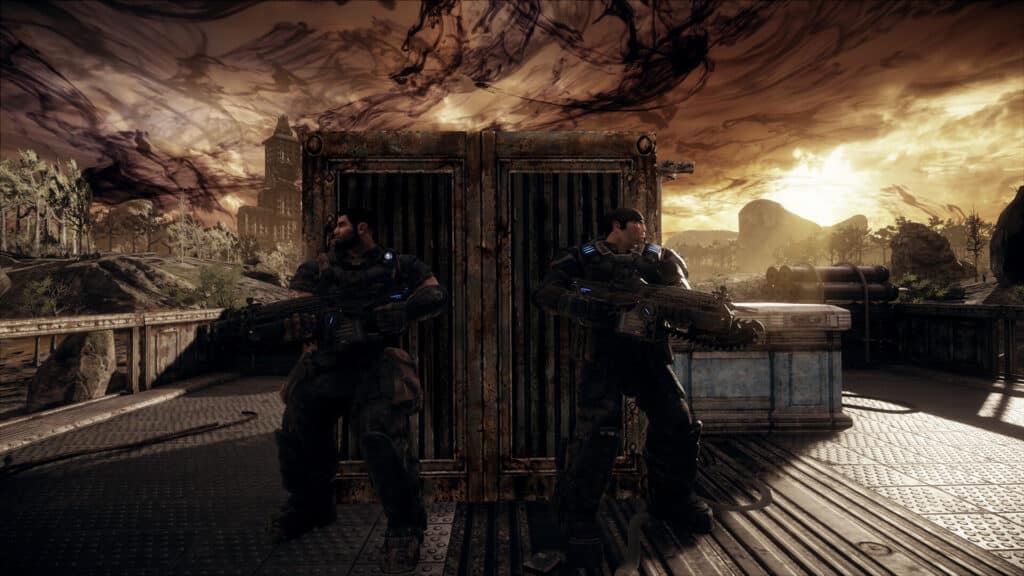 Two armored soldiers with rifles stand back-to-back behind cover under a dramatic, stormy sky, evoking the intense atmosphere of Gears of War Reloaded.